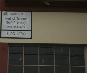 The Port of Tacoma plans to expand its operations by demolishing a building on the tide flats that served as one of Brown & Haley's warehouses for more than 40 years. (FILE PHOTO BY TODD MATTHEWS)