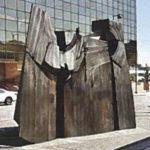 The publicly-owned bronze sculpture "Sun King" was created in 1976 by Oregon artist Thomas Morandi. It was originally installed outside the former Sheraton Hotel in downtown Tacoma (pictured). Five years ago, however, it was placed in storage to make way for a new sculpture. "Sun King" could be put on display again, this time at a park near Thea Foss Waterway. (IMAGE COURTESY CITY OF TACOMA)