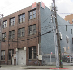 The former J. E. Aubry Wagon & Auto Works Building in downtown Tacoma. (PHOTO COURTESY ARTIFACTS CONSULTING)