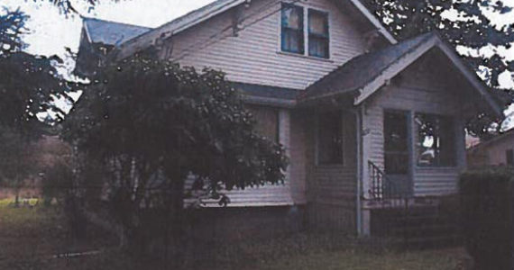 The 91-year-old J. M. Hendrickson Family Homestead in Tacoma belonged to several generations of one family that immigrated from Norway in 1888. The five-acre property — which included the house, garage, barn, site, and historic landscaping — was placed on Tacoma's Register of Historic Places two years ago. On Tuesday, Tacoma City Council adopted a resolution that changes the boundaries of the historic landmark from five acres to approximately 1.4 acres, while still including the historic structures. (IMAGE COURTESY CITY OF TACOMA)