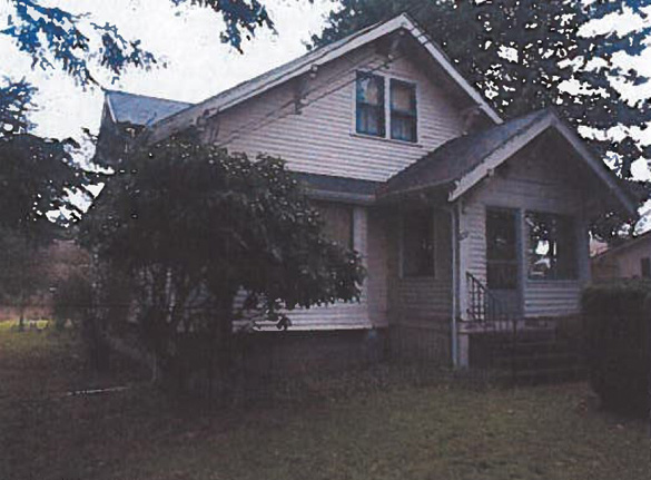 The 91-year-old J. M. Hendrickson Family Homestead in Tacoma belonged to several generations of one family that immigrated from Norway in 1888. The five-acre property — which included the house, garage, barn, site, and historic landscaping — was placed on Tacoma's Register of Historic Places two years ago. On Tuesday, Tacoma City Council adopted a resolution that changes the boundaries of the historic landmark from five acres to approximately 1.4 acres, while still including the historic structures. (IMAGE COURTESY CITY OF TACOMA)