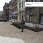 Tacoma Arts Administrator Amy McBride stands where the sculpture will be sited within the historic district. (IMAGE COURTESY CITY OF TACOMA)