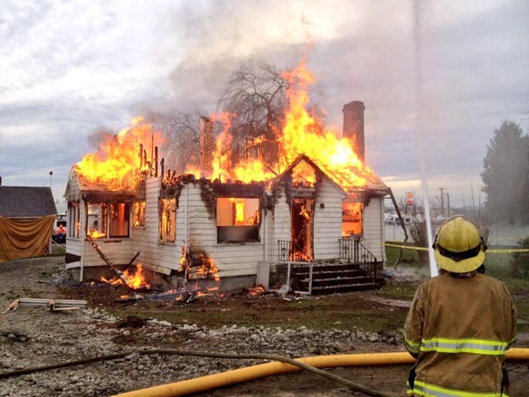 Tacoma firefighters were in Fife Tuesday to hone their skills under live fire conditions. Four engine crews from five different fire stations battled the controlled blaze, which was set at a vacant house in the 6200 block of 16th Street East and on property owned by Tacoma RV Center in Fife. (PHOTO COURTESY TACOMA FIRE DEPARTMENT)