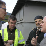 BioFuels Washington Managing Director Frank Mazanec (far right) discusses a new methane gas conversion facility at the LRI Landfill in Pierce County with (from left to right) Washington State Governor Jay Inslee, Waste Connections Division Vice President John Rodgers, and Tacoma City Councilmember David Boe. (PHOTO BY TODD MATTHEWS)