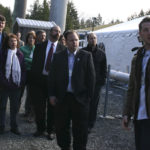 Project engineer Luke Stephenson leads elected officials on a guided tour of a new methane gas conversion facility at the LRI Landfill in Pierce County. (PHOTO BY TODD MATTHEWS)