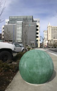 Six large, colorful orbs created by local artist Elizabeth Conner were installed this week along an eight-block stretch of Pacific Avenue in downtown Tacoma. (PHOTO BY TODD MATTHEWS)