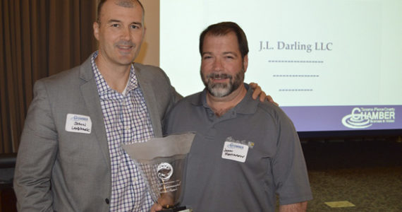 JL Darling's John Mattingly and Jason Landmark accept the 12th Annual Tahoma Environmental Business Award for outstanding environmental awareness and efficiency from the Tacoma-Pierce County Chamber. (PHOTO COURTESY TACOMA-PIERCE COUNTY CHAMBER)