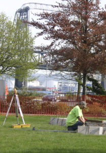 Contractors made final site preparations before concrete was poured Monday morning at the future home of Tacoma's Sun King sculpture. (PHOTO BY TODD MATTHEWS)