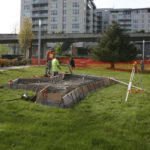 Contractors made final site preparations before concrete was poured Monday morning at the future home of Tacoma's Sun King sculpture. (PHOTO BY TODD MATTHEWS)