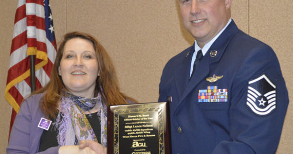 Amy Tiemeyer, Military Relations Liaison at America's Credit Union presented this year's Howard O. Scott Citizen-Soldier of the Year Award to 446th Airlift Wing Master Sergeant Lance Nelson. (PHOTO COURTESY TACOMA-PIERCE COUNTY CHAMBER)