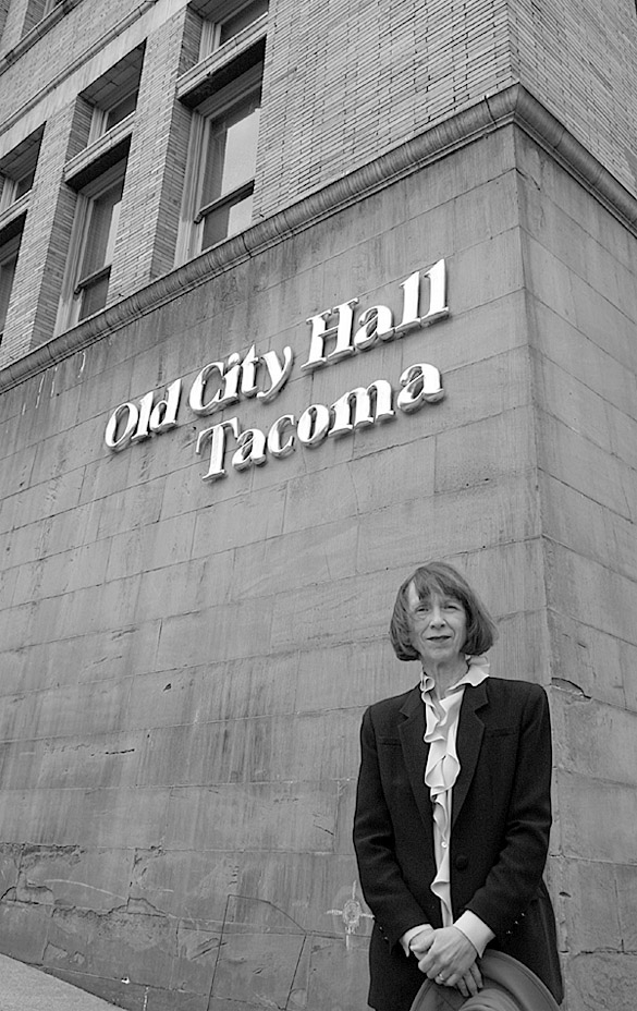 Historic Tacoma board president Sharon Winters outside Old City Hall. "The city is at a very vulnerable time right now," says Winters. "It's a very exciting time for Tacoma, but also a very vulnerable time for the old structures in town." (PHOTO BY TODD MATTHEWS)