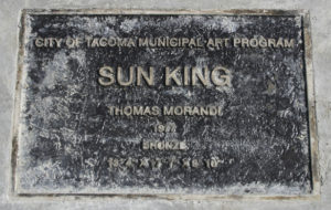 A plaque marks the spot for Tacoma's Sun King in a park near Thea Foss Waterway. (PHOTO BY TODD MATTHEWS)