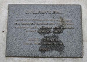 The City of Tacoma recently completed a project to restore the Children's Bell sculpture located along Ruston Way near the shores of Commencement Bay. The four-foot-tall bronze artwork was created in 2000 by artist Larry Anderson in order to celebrate the life, spirit, and accomplishments of Washington PAVE Founder and Director Marty Gentili, who passed away in 1993. The bell is decorated with images of children around the border and is meant to be rung by visitors. In April, area visitors noticed safety barricades were in place around the sculpture while the contractor spent several weeks completing restoration work on the Children's Bell sculpture. (PHOTO BY TODD MATTHEWS)