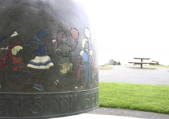 The City of Tacoma recently completed a project to restore the Children's Bell sculpture located along Ruston Way near the shores of Commencement Bay. The four-foot-tall bronze artwork was created in 2000 by artist Larry Anderson in order to celebrate the life, spirit, and accomplishments of Washington PAVE Founder and Director Marty Gentili, who passed away in 1993. The bell is decorated with images of children around the border and is meant to be rung by visitors. In April, area visitors noticed safety barricades were in place around the sculpture while the contractor spent several weeks completing restoration work on the Children's Bell sculpture. (PHOTO BY TODD MATTHEWS)