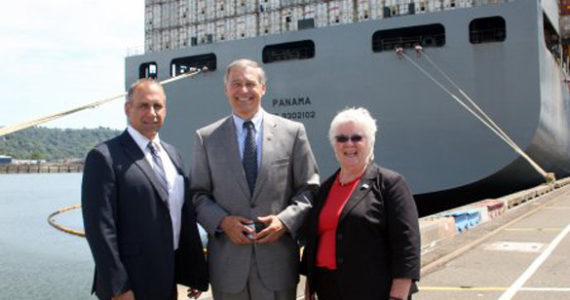 Washington State Governor Jay Inslee (center) was at the Port of Tacoma Monday to learn more about a project that aims to modernize the Husky Container Terminal. He was joined by Port of Tacoma CEO John Wolfe and Port of Tacoma Commissioner Clare Petrich. (PHOTO COURTESY PORT OF TACOMA)