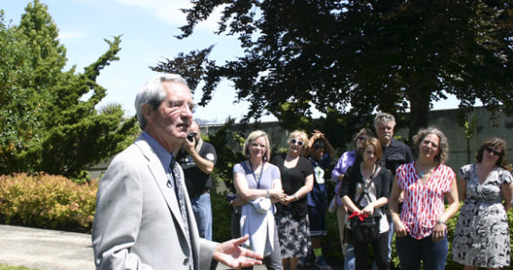 Artist Tom Morandi discussed the history of Sun King during a celebration Wednesday to mark the installation of his sculpture in a public park near Thea Foss Waterway. (PHOTO BY TODD MATTHEWS)