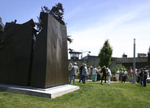 Art supporters gathered Wednesday in downtown Tacoma to celebrate the installation of Tom Morandi's Sun King sculpture in a public park near Thea Foss Waterway. (PHOTO BY TODD MATTHEWS)