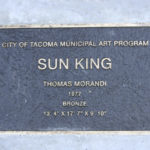 A plaque marks the spot for Tacoma's Sun King in a park near Thea Foss Waterway. (PHOTO BY TODD MATTHEWS)