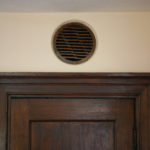 Tacoma architect Stanley Shaw experimented with a number of creative architectural designs in his own home. In the living room, he re-purposed a wooden grille from an old Victrola and installed it above a closet door to provide ventilation for wet coats. (PHOTO COURTESY SUSAN JOHNSON / ARTIFACTS CONSULTING)