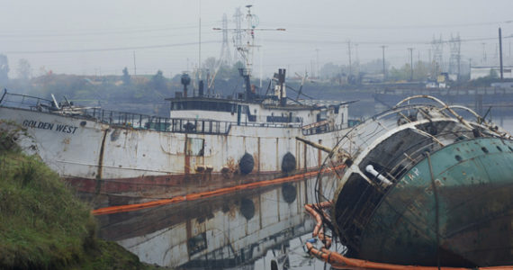 Two derelict vessels -- F/V Helena Star and F/V Golden West -- were chained together at the old Mason Marine location on Tacoma's Hylebos Waterway when they began to sink on Jan. 25, 2013. (PHOTO COURTESY WASHINGTON STATE DEPARTMENT OF ECOLOGY)