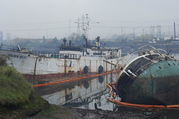 Two derelict vessels -- F/V Helena Star and F/V Golden West -- were chained together at the old Mason Marine location on Tacoma's Hylebos Waterway when they began to sink on Jan. 25, 2013. (PHOTO COURTESY WASHINGTON STATE DEPARTMENT OF ECOLOGY)