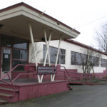 The last days of the former Brown & Haley headquarters and warehouse on the Port of Tacoma tide flats are near. The sprawling, abandoned, and boarded up warehouse near the corner of East 11th Street and Thorne Road was home to the world-famous Tacoma candy maker for more than 40 years. (FILE PHOTO BY TODD MATTHEWS)