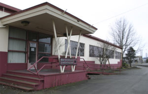 The last days of the former Brown & Haley headquarters and warehouse on the Port of Tacoma tide flats are near. The sprawling, abandoned, and boarded up warehouse near the corner of East 11th Street and Thorne Road was home to the world-famous Tacoma candy maker for more than 40 years. (FILE PHOTO BY TODD MATTHEWS)