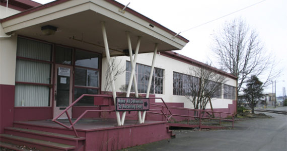 The last days of the former Brown & Haley headquarters and warehouse on the Port of Tacoma tide flats are near. The sprawling, abandoned, and boarded up warehouse near the corner of East 11th Street and Thorne Road was home to the world-famous Tacoma candy maker for more than 40 years. (FILE PHOTO BY TODD MATTHEWS)