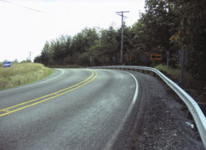 A stretch of 9th Street East, between 190th Avenue East and 198th Avenue East, was reconstructed to enhance safety by re-aligning and regrading the roadway to increase sight distances. The road was closed in June to allow a Pierce County contractor to excavate the site and lay asphalt. The road was re-opened last week, nearly two weeks ahead of schedule. Crews will continue to work along the roadway through September in order to allow crews to complete planting preparation aspects of the project. Periodic lane restrictions are expected during that time. (IMAGE COURTESY PIERCE COUNTY)