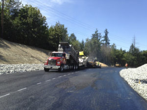 A stretch of 9th Street East, between 190th Avenue East and 198th Avenue East, was reconstructed to enhance safety by re-aligning and regrading the roadway to increase sight distances. The road was closed in June to allow a Pierce County contractor to excavate the site and lay asphalt. The road was re-opened last week, nearly two weeks ahead of schedule. Crews will continue to work along the roadway through September in order to allow crews to complete planting preparation aspects of the project. Periodic lane restrictions are expected during that time. (IMAGE COURTESY PIERCE COUNTY)