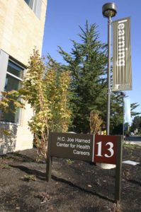 Tacoma Community College celebrated the grand opening of the $39 million H.C. "Joe" Harned Center for Health Careers during a ribbon-cutting ceremony on Thurs., Sept. 4. (PHOTO BY TODD MATTHEWS)