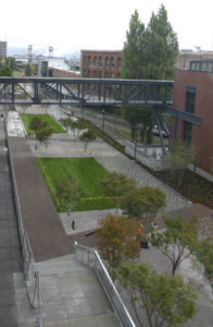 Contractors on Tuesday were putting the finishing touches on a segment of the Prairie Line Trail that runs through the University of Washington Tacoma (UWT) campus. City of Tacoma and UWT officials will celebrate the grand opening of the first phase of the new urban trail during a public ceremony on Thurs., Sept. 25, at 5 p.m. (PHOTO BY TODD MATTHEWS)