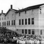 Administrators, faculty, and students gather outside the Japanese Language School in downtown Tacoma on May 22, 1927. According to University of Washington Tacoma officials, between 1911 and 1942, the school served Tacoma's thriving Japanese-American community by teaching young people the language, arts, and cultural traditions of Japan, the homeland of their parents and grandparents. (IMAGE COURTESY UNIVERSITY OF WASHINGTON TACOMA)
