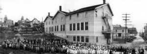 Administrators, faculty, and students gather outside the Japanese Language School in downtown Tacoma on May 22, 1927. According to University of Washington Tacoma officials, between 1911 and 1942, the school served Tacoma's thriving Japanese-American community by teaching young people the language, arts, and cultural traditions of Japan, the homeland of their parents and grandparents. (IMAGE COURTESY UNIVERSITY OF WASHINGTON TACOMA)