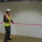 Pierce County AIDS Foundation Executive Director Duane Wilkerson breaks ground on the renovation of a nearly-10,000-square-foot building in South Tacoma that will serve as the organization's new headquarters beginning early next year. (PHOTO COURTESY PIERCE COUNTY AIDS FOUNDATION)