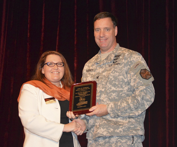 America's Credit Union's Military Relations Liaison Amy Tiemeyer presents the Tacoma-Pierce County Chamber's 35th Annual John H. Anderson Military Citizen of the Year Award to Colonel H. Charles "Chuck" Hodges, Jr. (PHOTO COURTESY TACOMA-PIERCE COUNTY CHAMBER)