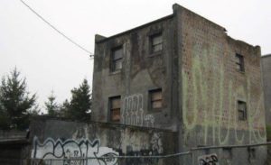 A building at 1313-1/2 Fawcett Ave. slated for demolition. (PHOTO COURTESY CITY OF TACOMA)