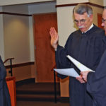 Pierce County Executive Pat McCarthy (left) was sworn in on Jan. 2, 2009, by Washington State Supreme Court Justice Charles W. Johnson (center) and (right) Pierce County Superior Court Judge John A. McCarthy. (PHOTO COURTESY PIERCE COUNTY)