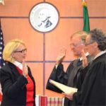 Pierce County Executive Pat McCarthy (left) was sworn in on Dec. 20, 2012, by Pierce County Superior Court Judge Ronald Culpepper (center) and (right) Pierce County Superior Court Judge John McCarthy, after she was re-elected by voters. (PHOTO COURTESY PIERCE COUNTY)