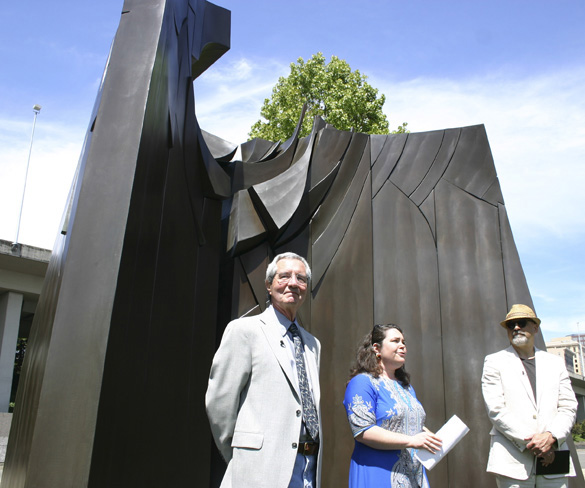 Sculptor Tom Morandi, Tacoma Arts Commission Chair Traci Kelly, and Tacoma City Councilmember David Boe gathered in downtown Tacoma this summer to celebrate the installation of Morandi's Sun King sculpture in a public park near Thea Foss Waterway. (PHOTO BY TODD MATTHEWS)