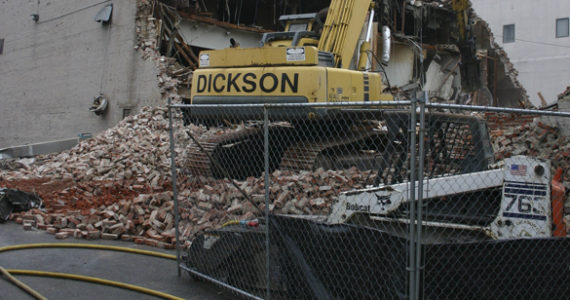 Work is under way this week to demolish a 110-year-old, county-owned building in downtown Tacoma. (PHOTO BY TODD MATTHEWS)