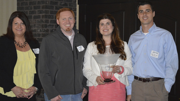 Targa Sound Terminal's Linda Troeh, Jeremiah Jones, Bett Lucas, and Justin Ranes accepted the 11th Annual Tahoma Environmental Business Award from the Tacoma-Pierce County Chamber in 2013. (PHOTO COURTESY TACOMA-PIERCE COUNTY CHAMBER)
