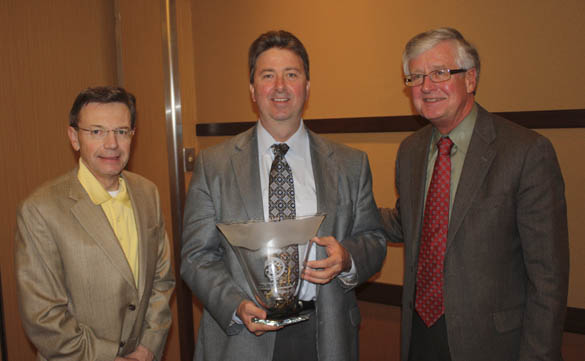 Steve Thomason (LEFT) and Tom Taylor (RIGHT) of Taylor-Thomason Insurance presented the Tacoma-Pierce County Chamber's 9th Annual Tahoma Environmental Business Award to Waste Connections Western Region Vice-President of Government Affairs Eddie Westmoreland in 2011. (PHOTO COURTESY TACOMA-PIERCE COUNTY CHAMBER)