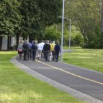 Pedestrians gathered near South 74th Street and South Cedar Street for a ribbon-cutting ceremony to mark the recently restored 1.8-mile segment of the historic Water Flume Line Trail. (PHOTO BY TODD MATTHEWS)