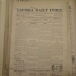 A box stored in the archives at Tacoma Public Library's Northwest Room contains issues of the Tacoma Daily Index that date back to 1916. (PHOTO BY TODD MATTHEWS)