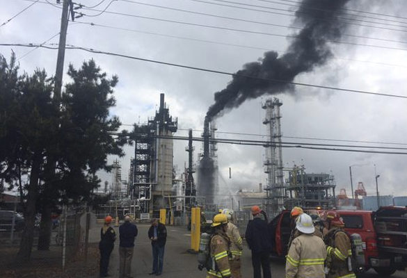 Tacoma fire fighters responded Wednesday morning to reports of a crude oil burning at a refinery located on the Port of Tacoma tide flats. (PHOTO COURTESY TACOMA FIRE DEPARTMENT)