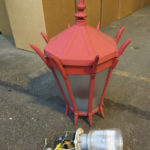 Dozens of red street lamps that once lined Tacoma's Lincoln International Business District were recently replaced with new light-emitting diode (LED) bulbs and fixtures. The old fixtures were recently re-packaged, deemed surplus, and offered up for donation by the City of Tacoma. (PHOTO COURTESY CITY OF TACOMA)