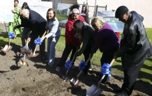 The City of Tacoma and Metro Parks Tacoma hosted a groundbreaking ceremony Thursday to mark the beginning of a $7.6 million project that will create a swimming pool and aquatics facility at the People's Community Center in Tacoma's Hilltop neighborhood. (PHOTO BY TODD MATTHEWS)