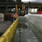 The project includes three hydrostatic lift gates that will operate automatically during a flooding event. (PHOTO BY TODD MATTHEWS)