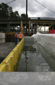 The project includes three hydrostatic lift gates that will operate automatically during a flooding event. (PHOTO BY TODD MATTHEWS)